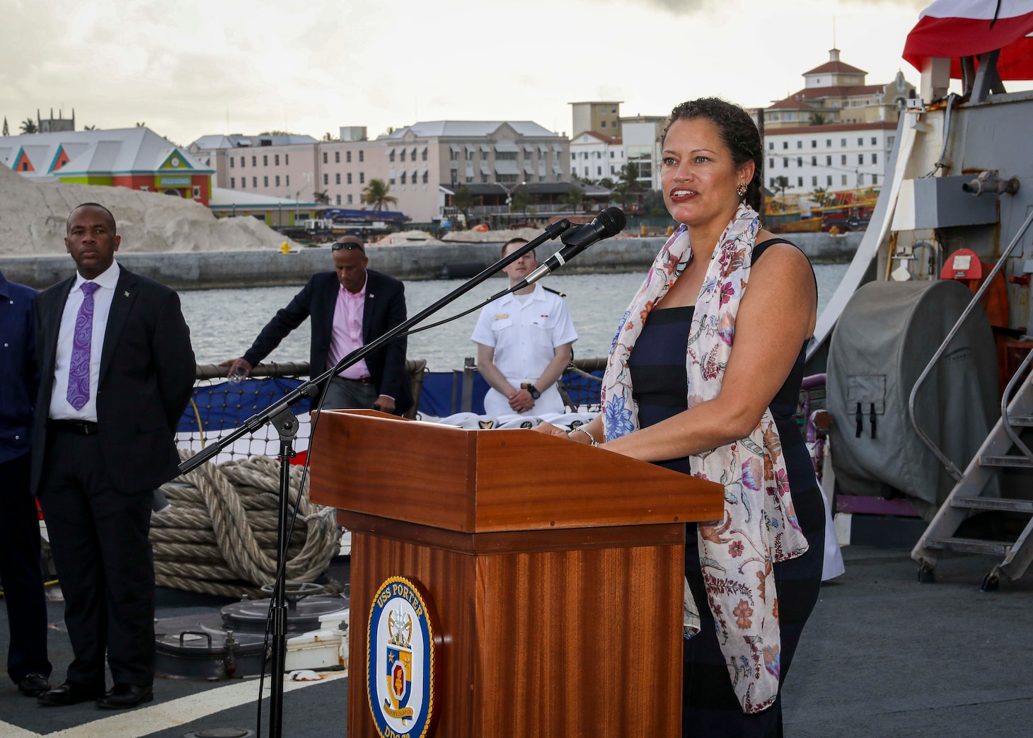 NASSAU, The Bahamas (April 3, 2022) – Ms. Usha Pitts, the Charge d'Affaires of the U.S. Embassy Nassau, gives her opening remarks during a reception held on the flight deck of the Arleigh Burke-class guided-missile destroyer USS Porter (DDG 78), April 3. Porter, forward-deployed to Rota, Spain, is currently in the U.S. 2nd Fleet area of operations to conduct routine certifications and training. (U.S. Navy photo by Mass Communication Specialist 1st Class Eric Coffer/Released)