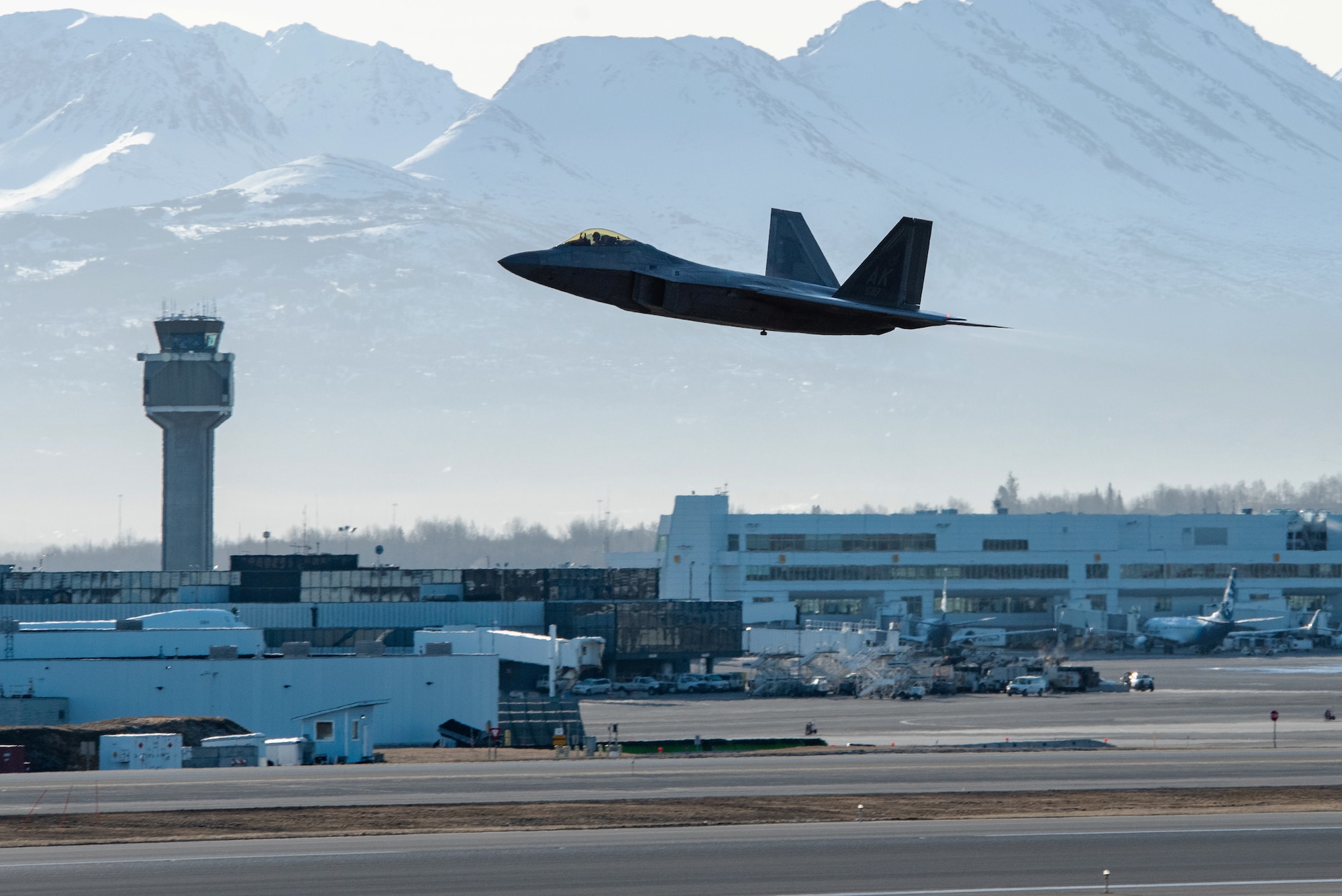 A photo of an F-22 Raptor taking off.