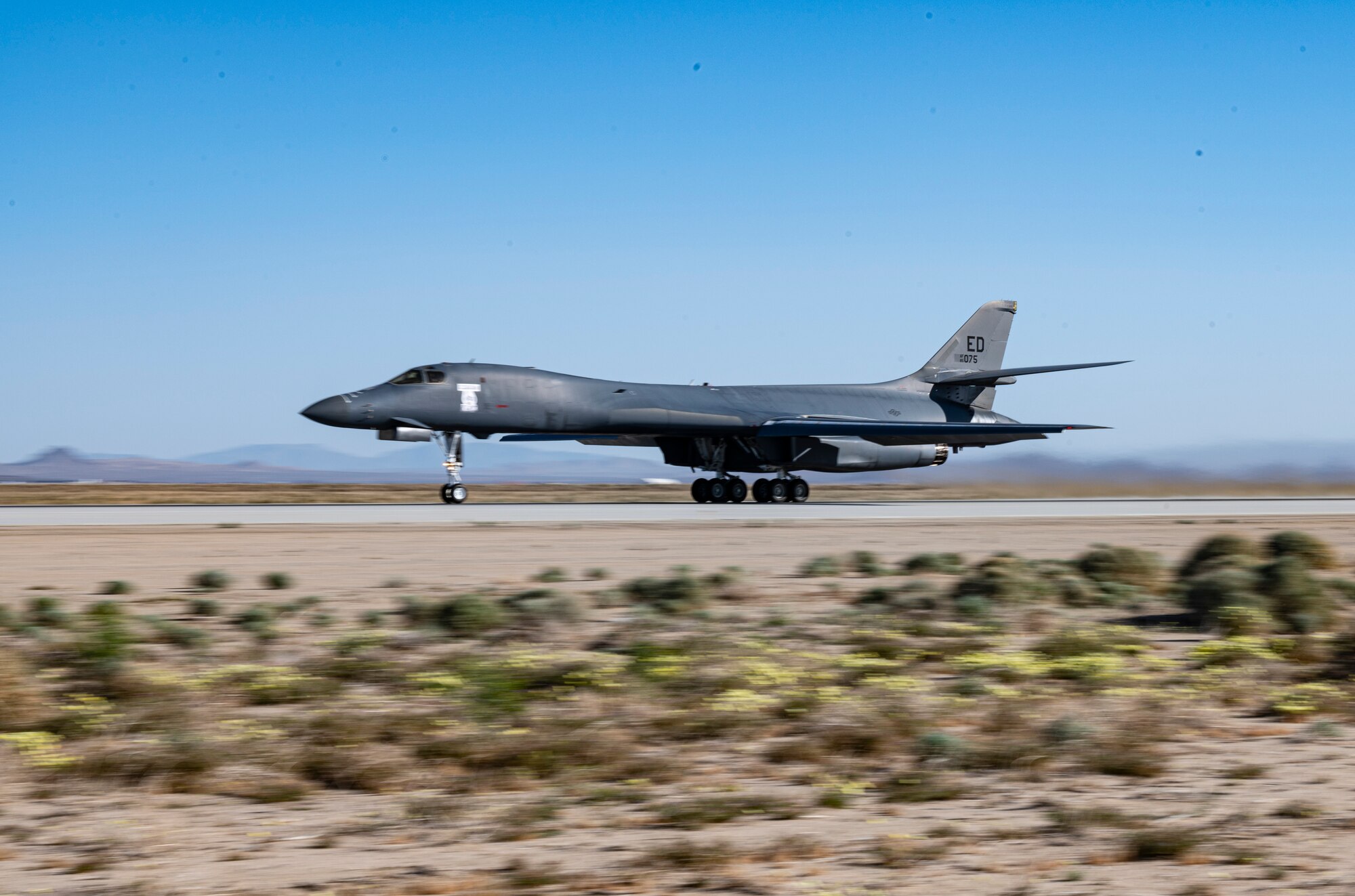 A B-1B Lancer takes off from Edwards Air Force Base to Tinker AFB for PDM.