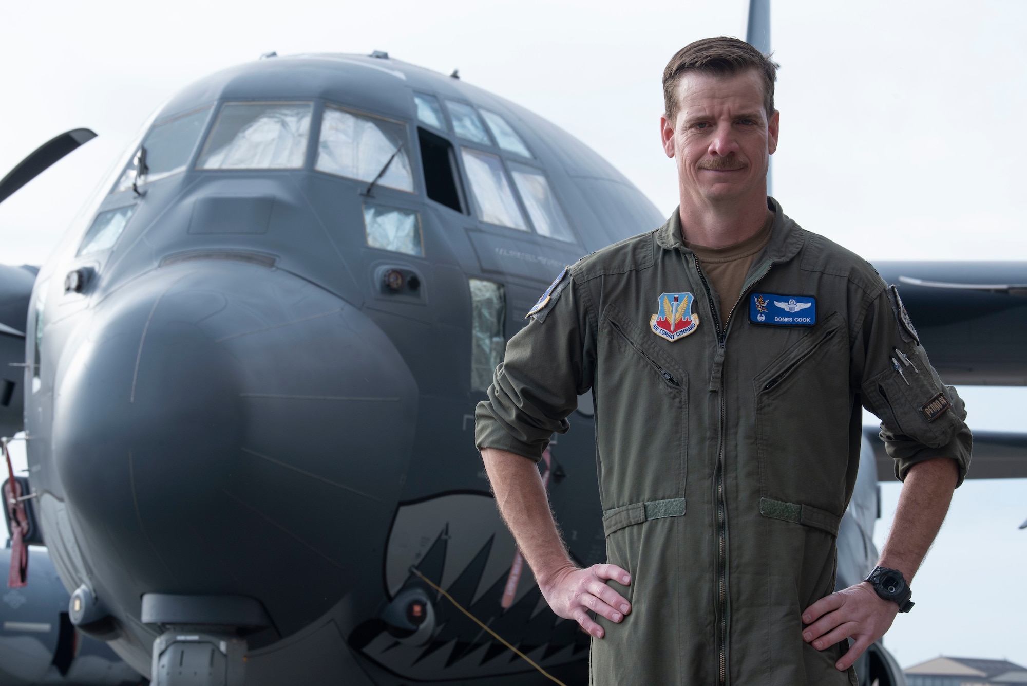 U.S. Air Force Col. Russell “Bones” Cook, 23rd Wing commander,  stands in front of HC-130J Combat King II 13-5785 after a Flagship dedication ceremony at Moody Air Force Base, Georgia, March 30, 2022. A Wing’s Flagship stands as a rallying point for the command. (U.S. Air Force photo by Senior Airman Thomas Johns)