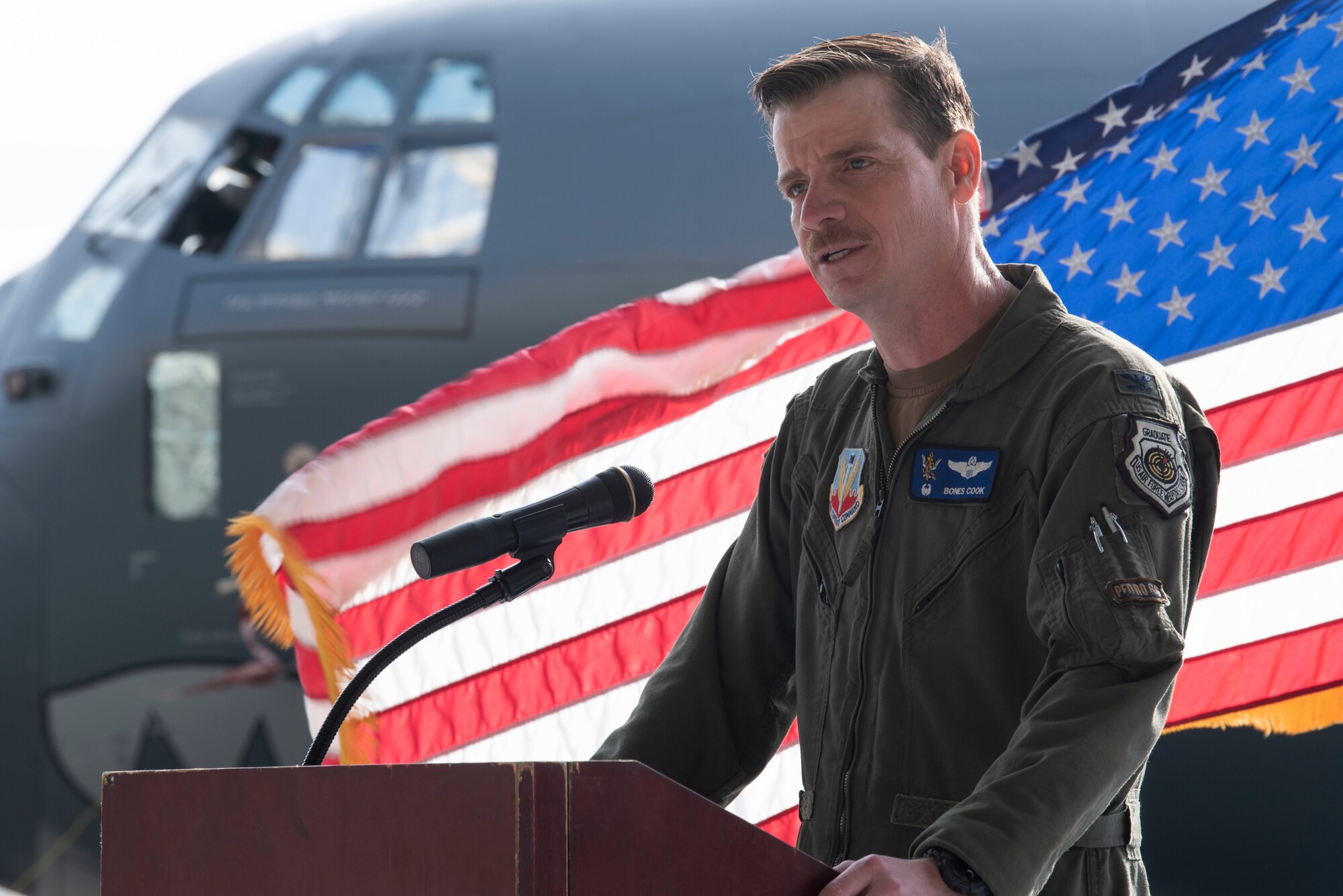 U.S. Air Force Col. Russell “Bones” Cook, 23rd Wing commander, delivers a speech during a Flagship dedication ceremony at Moody Air Force Base, Georgia, March 30, 2022. Flagship aircrafts are dedicated when an officer takes command of an operational unit. (U.S. Air Force photo by Senior Airman Thomas Johns)