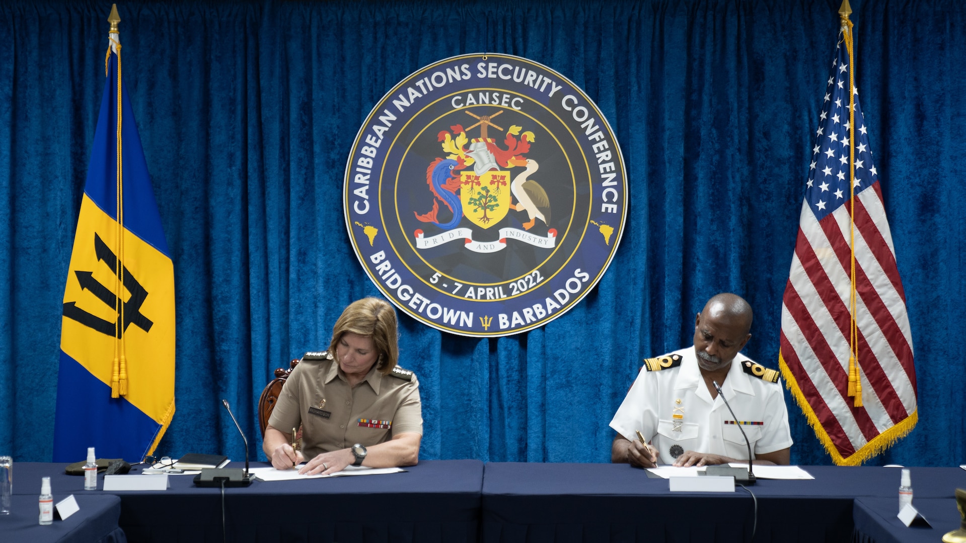 Army Gen. Laura J. Richardson, U.S. Southern Command commander, and Barbados Defence Force Chief of Staff, Commodore Errington Shurland, sign an Engagement and Cooperation Framework.