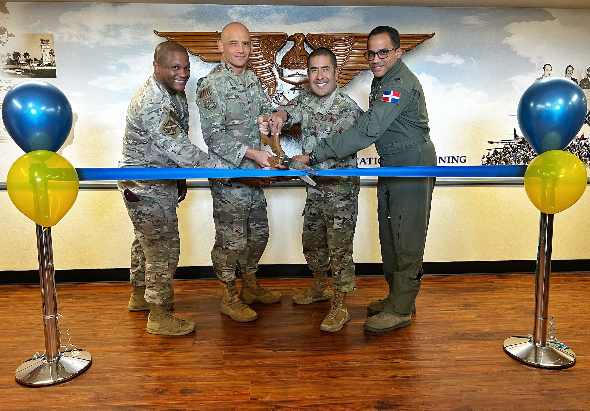 IAAFA and 37 TRW leaders cut ribbon at heritage wall
