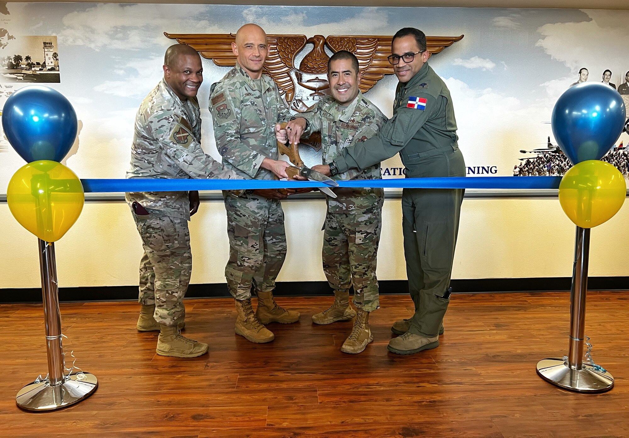 IAAFA and 37 TRW leaders cut ribbon at heritage wall