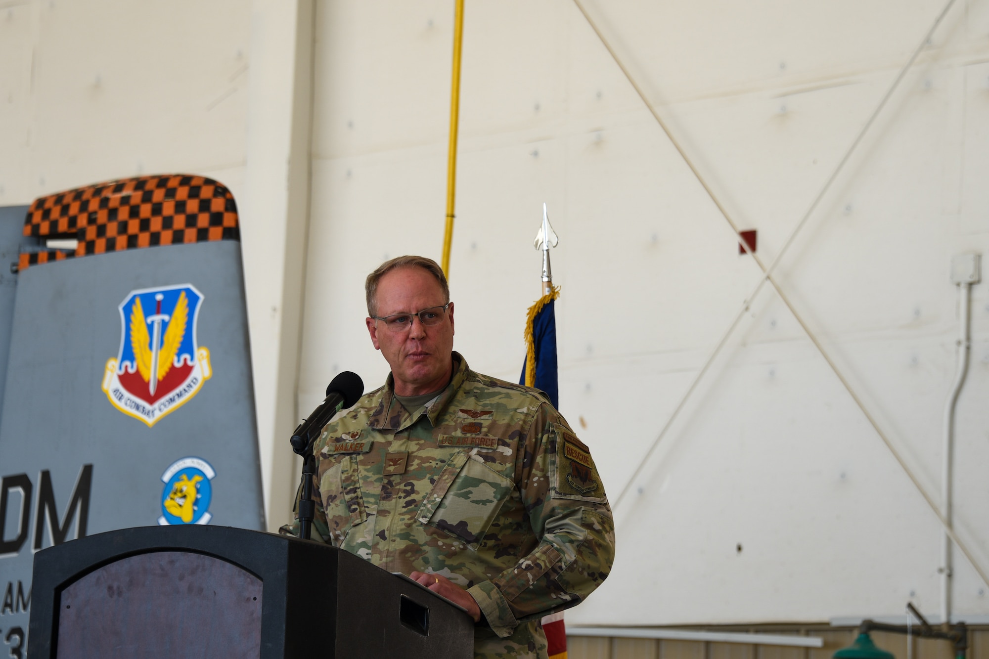 A photo of an Airmen giving a speech.