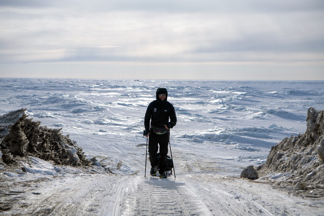 Maj. Joshua Brown, 673rd Surgical Operations Squadron Surgical Services flight commander, hikes into Nome, Alaska