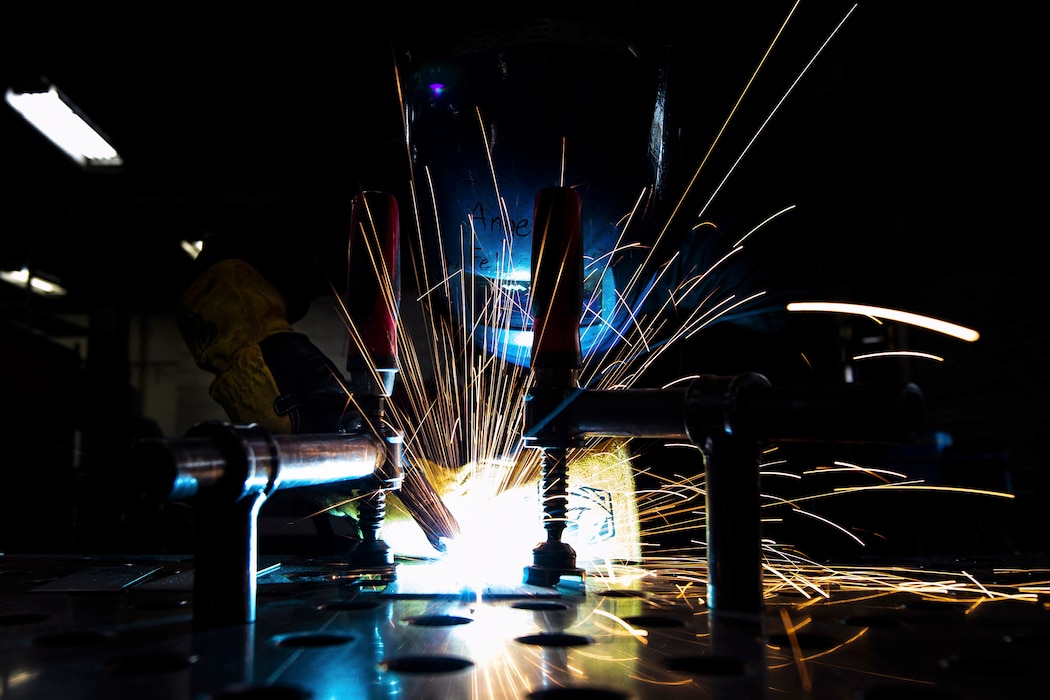 Airman 1st Class Angel Felix, 18th Equipment Maintenance Squadron aircraft metals technician, performs metal inert gas welding