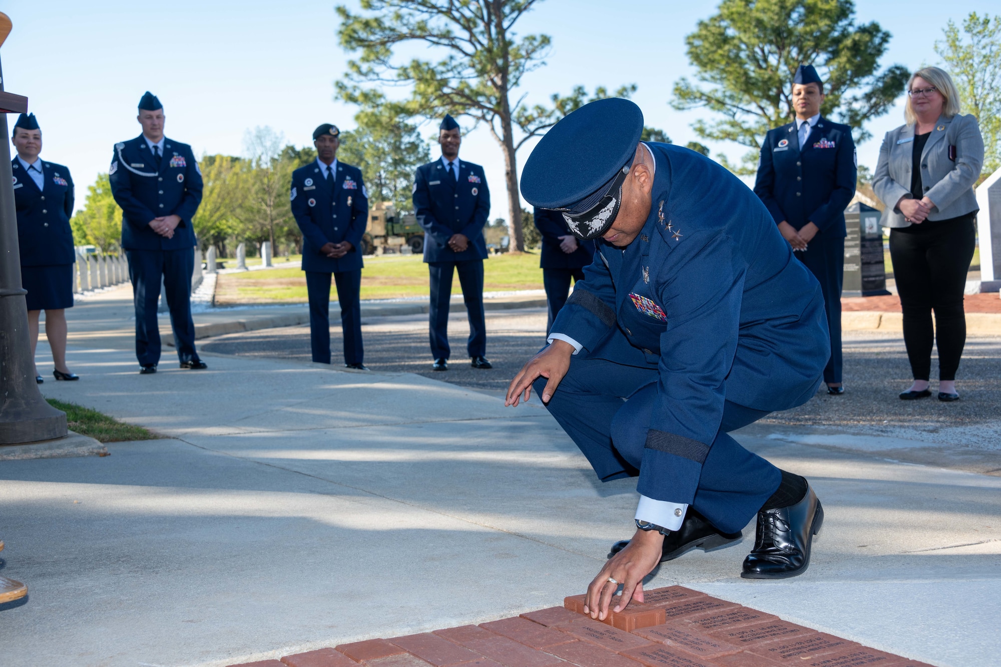 Gen. Anthony J. Cotton, Commander, U.S. Air Force Global Strike Command and Commander, Air Forces Strategic-Air, U.S. Strategic Command, places a brick honoring his support for the enlisted corps at the Enlisted Heritage Research Institute, Apr. 1, 2022.