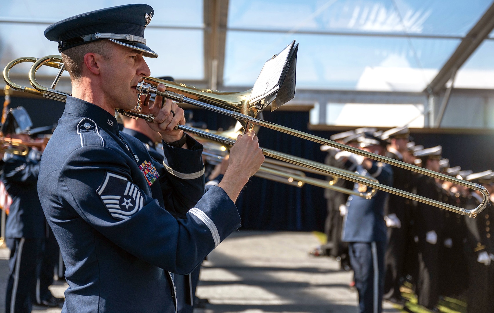 Air Force MSgt. Douglas Kost, Band of the West section chief of operations, plays the trombone