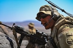 U.S. Army Staff Sgt. Chris Barksdale, a squad leader with the East Africa Response Force (EARF), Task Force Red Dragon, Combined Joint Task Force – Horn of Africa, commands his team during Exercise WAKRI 22 at Grand Bara, Djibouti, March 15, 2022. Exercise WAKRI 22, the largest annual French-led exercise on the African continent, was spread out across Djibouti and provided realistic training for French Armed Forces' air, ground and sea components alongside their U.S. allies.