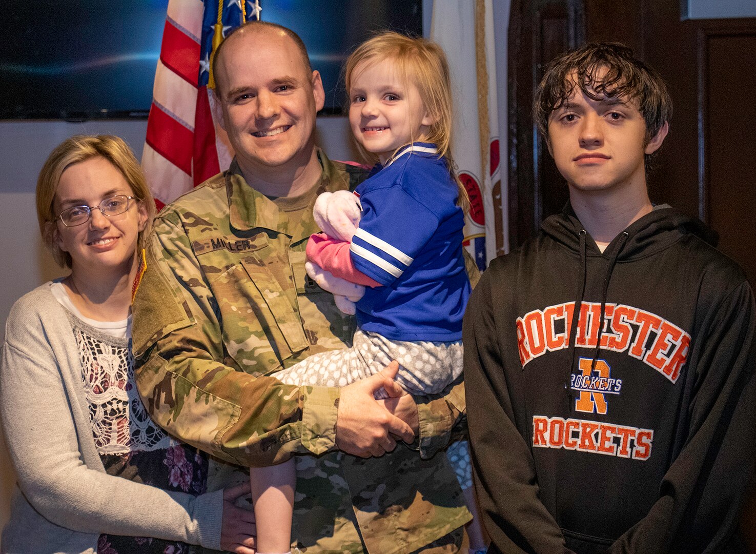 Newly promoted Chief Warrant Officer 4 David Miller, Jr., with wife, Teresa, daughter Elizabeth and son, Alex.
