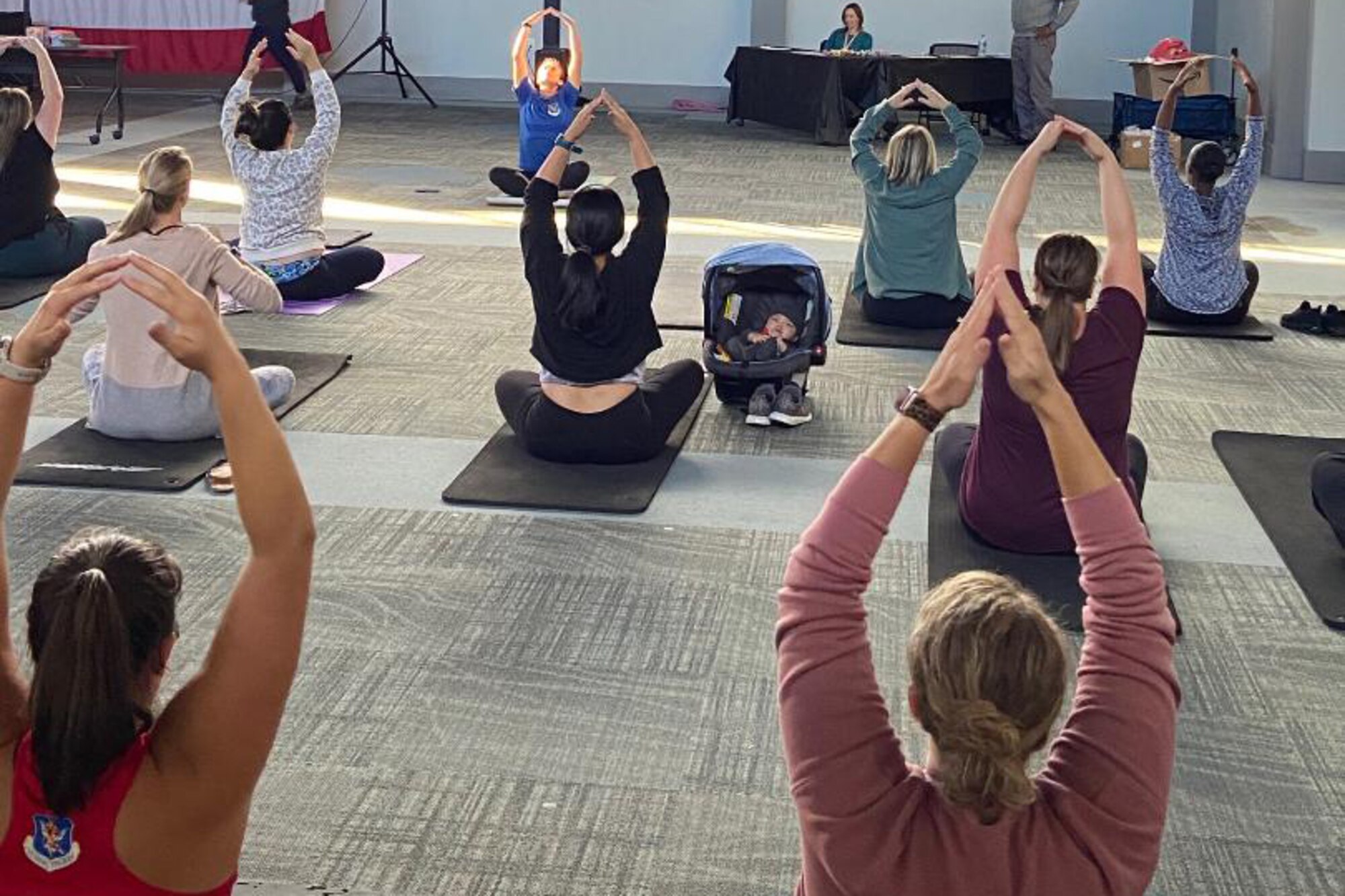 Photo of Key spouses stretching