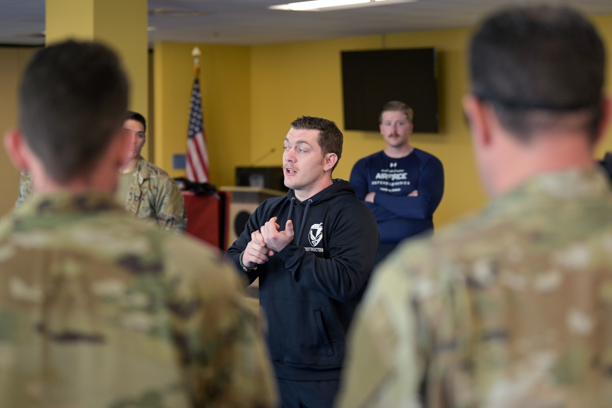 U.S. Air Force Staff Sgt. Zachery Jezewski, an Air Force senior combatives instructor, with the 421st Combat Training Squadron, Joint Base Mcguire-Dix-Lakehurst, conducts briefing to all Airmen and highlights safety and expectations, March 17, 2022 at Muñiz Air National Guard Base, Puerto Rico. The Air Force Combative training the 22 Airmen received can be applied on duty as much as off duty in a personal defense or life threatening situation. “Once these Airmen graduate, they’ll be able to conduct basic combatives training for anyone in the unit or anyone on base as far as life saving, self protection assets,” said Jezewski. (U.S. Air National Guard photo by Master Sgt. Rafael D. Rosa)