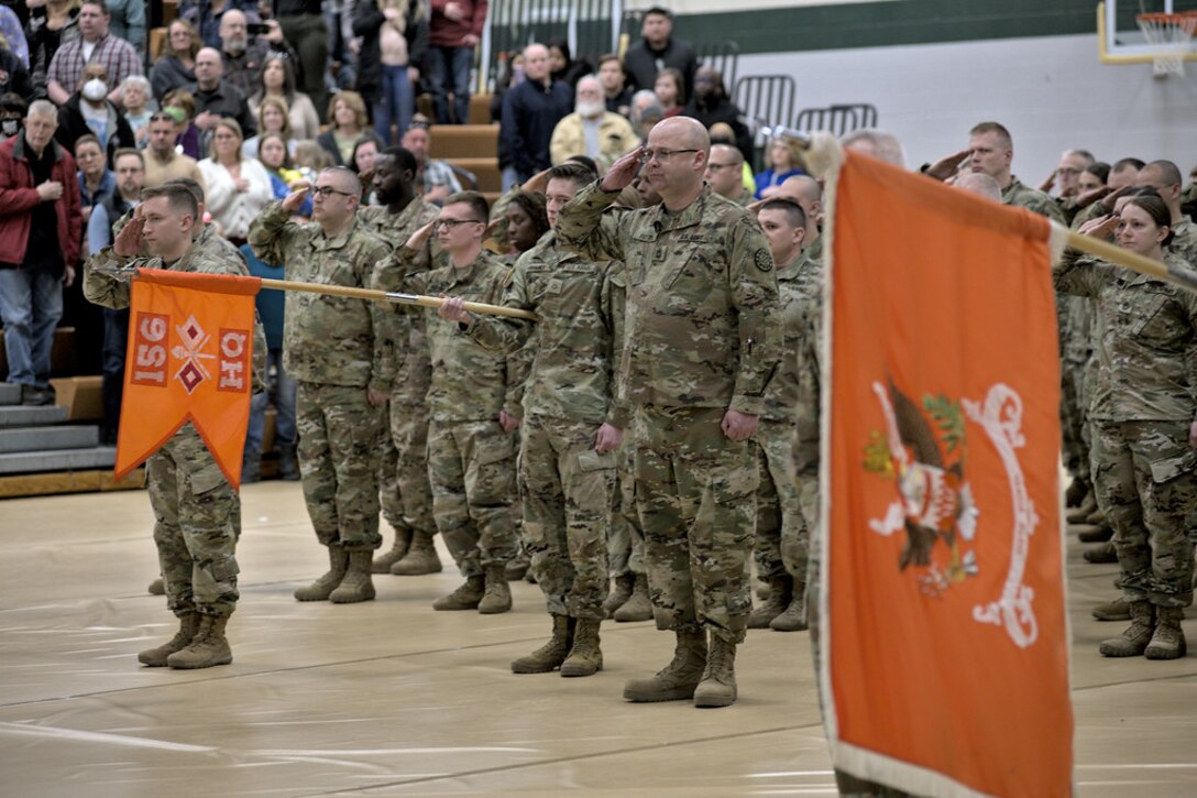 On April 2, 2022, approximately 350 Soldiers assigned to the Michigan Army National Guard 156th Expeditionary Signal Battalion (ESB), based in Howell, Mich. gathered with their families and invited guests at Battle Creek Air National Guard Base and at Howell High School as they prepared to depart for their deployment to the Middle East. (U.S. Air National Guard photo by Staff Sgt. Jacob Cessna)