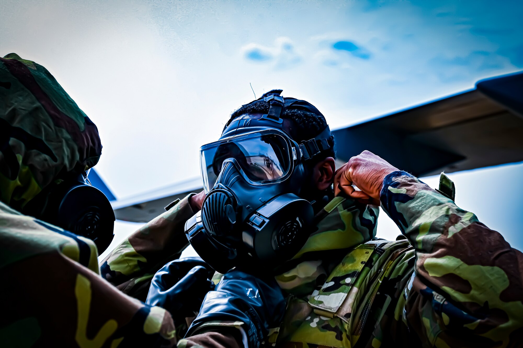 A U.S. Air Force Airman from the 305th Air Mobility Wing puts on mission oriented protective posture gear, demonstrating the ability to survive and operate in a contested environment during a readiness exercise at Joint Base McGuire-Dix-Lakehurst, New Jersey, Apr. 4, 2022. Training exercises reinforce Airmen readiness and deliberately strengthen Air Mobility Command’s warfighting culture in order to provide unrivaled Rapid Global Mobility capable of protecting and sustaining the Joint Force.