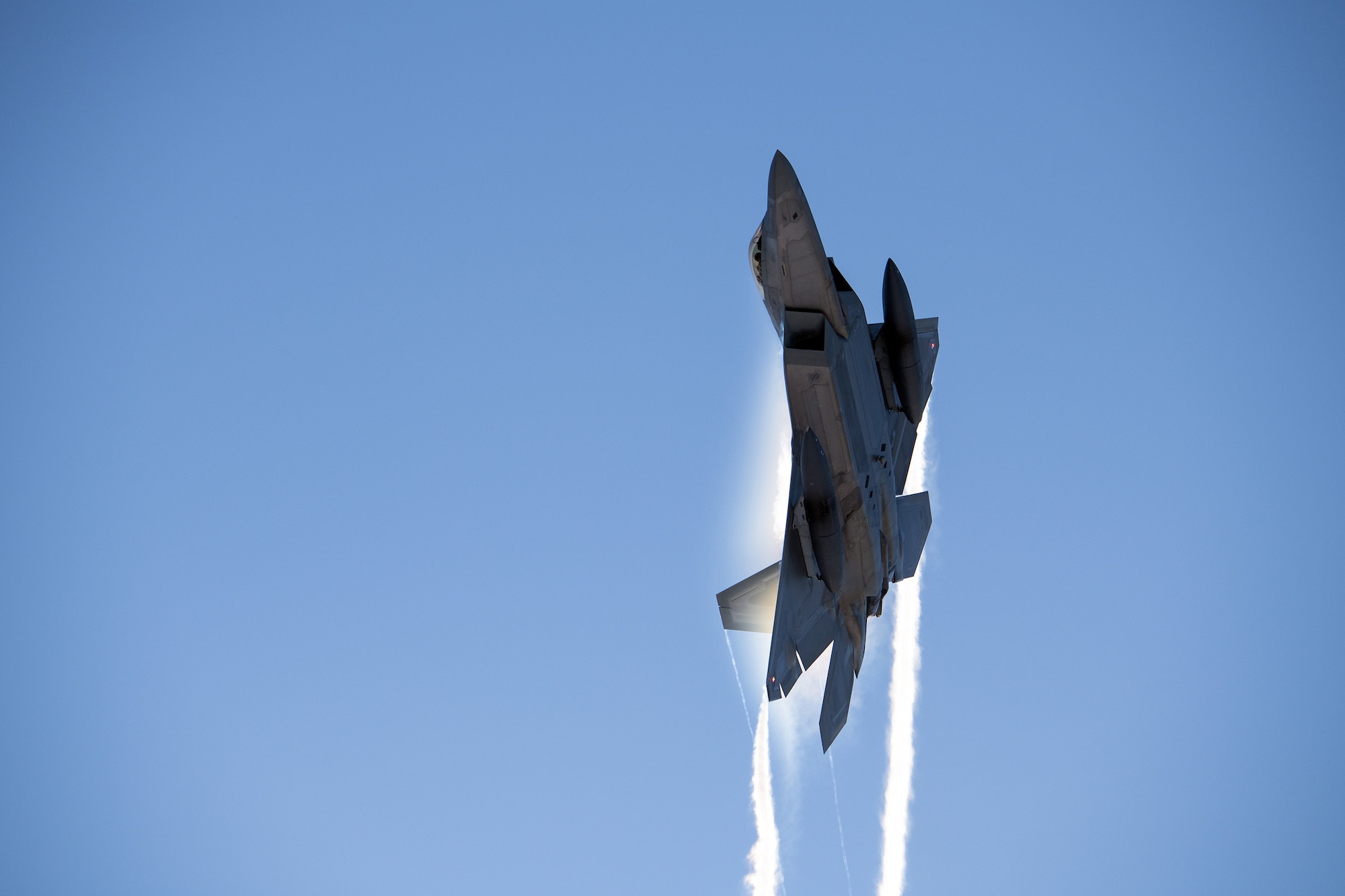 An F-22 Raptor assigned to the 3rd Wing flies over Joint Base Elmendorf-Richardson, Alaska