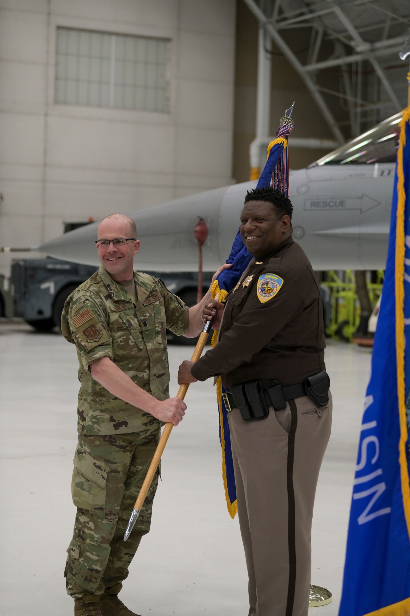 Local community leaders tour the 115th Fighter Wing, Madison, Wisconsin April 6, 2022 during an event commemorating their new role as Honorary Commanders. The Honorary Commander Program was developed to allow local community and business leaders and opportunity to gain insight into the fighter wing's mission and overall U.S. Air Force way of life. (U.S. Air National Guard photo by Staff Sgt. Cameron Lewis)