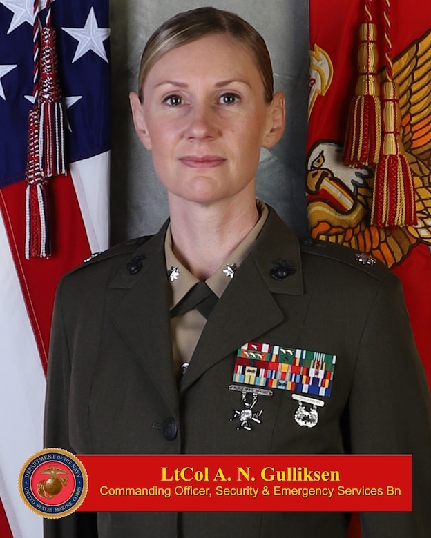 U.S. Marine Lt. Col. Andrea Gulliksen poses for her command board photo at Marine Corps Base Camp Pendleton, April 5, 2022. Gulliksen is the new commanding officer for Security and Emergency Services Battalion, MCB Camp Pendleton. (U.S. Marine Corps photo illustration)