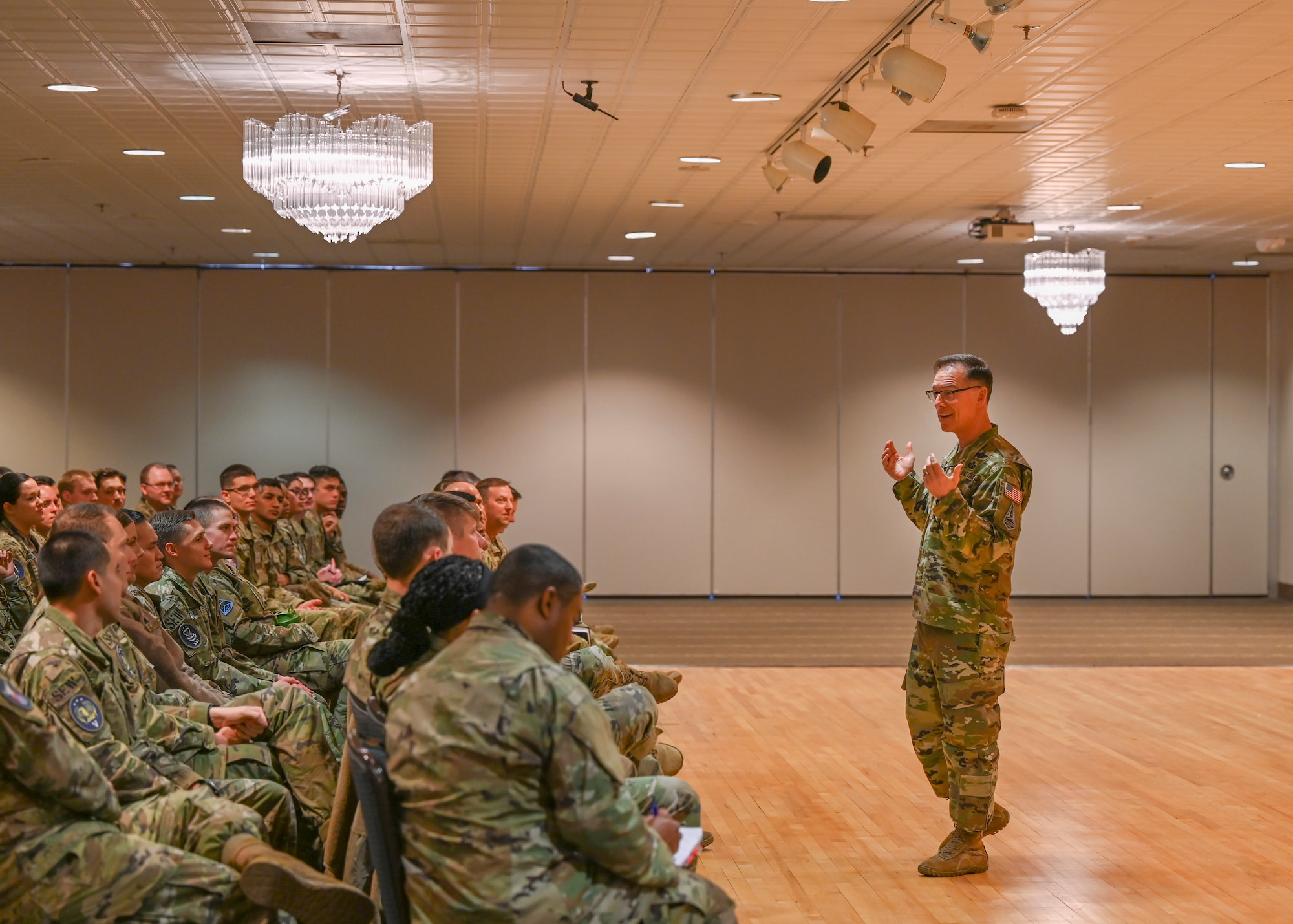 Chief Master Sgt. of the Space Force Roger A. Towberman talks to Airmen and Guardians from around the Peterson-Schriever Garrison during an all-call at Peterson Space Force Base, Colorado, April 7, 2021. The all-call consisted of an hour and a half of discussing about the future of the U.S. Space Force such as uniform availability, if there is a push for more base housing for Guardians, and the possibility of completely changing the promotion structure for E-1 through E-4 for Guardians. (U.S. Space Force photo by Senior Airman Andrew Bertain)