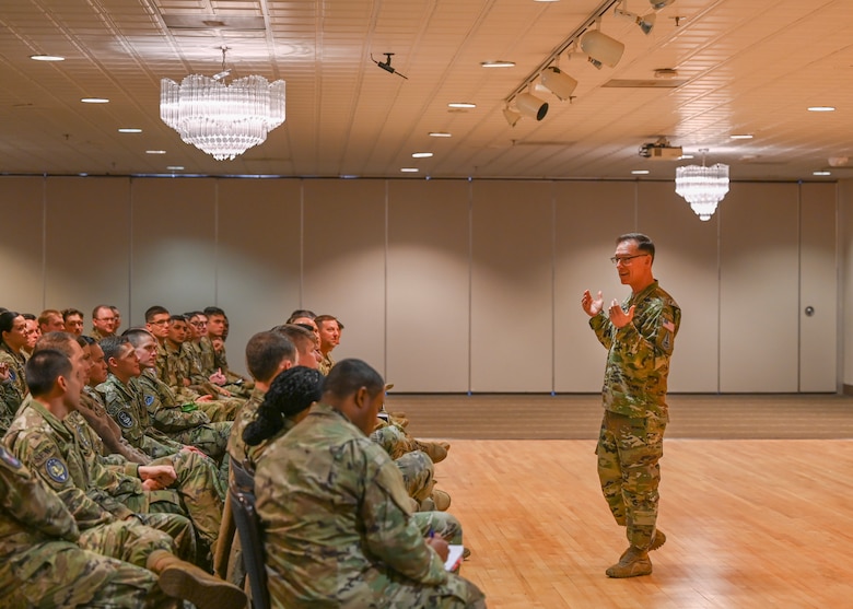 Chief Master Sgt. of the Space Force Roger A. Towberman talks to Airmen and Guardians from around the Peterson-Schriever Garrison during an all-call at Peterson Space Force Base, Colorado, April 7, 2021. The all-call consisted of an hour and a half of discussing about the future of the U.S. Space Force such as uniform availability, if there is a push for more base housing for Guardians, and the possibility of completely changing the promotion structure for E-1 through E-4 for Guardians. (U.S. Space Force photo by Senior Airman Andrew Bertain)