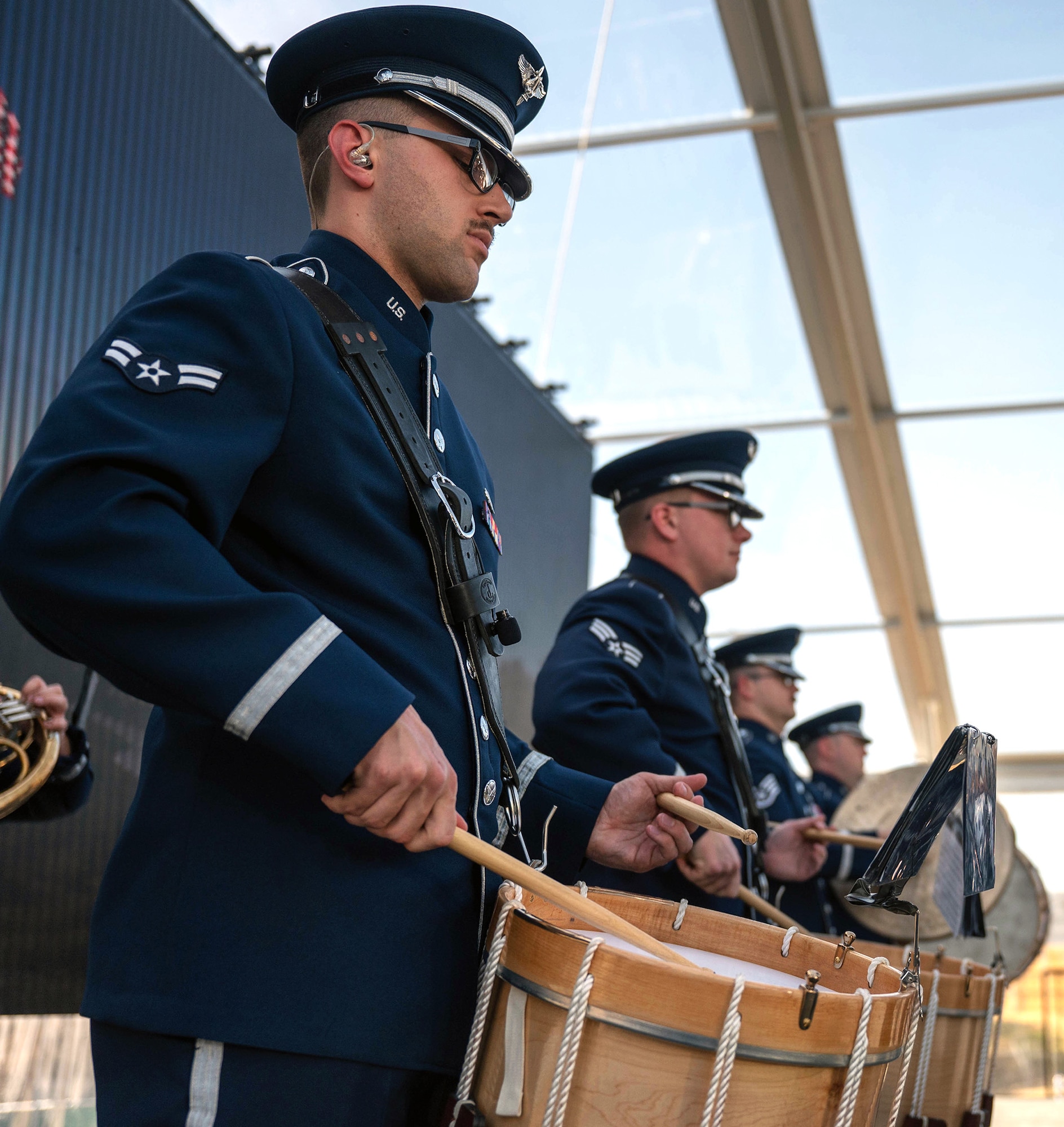 Air Force Airman 1st Class Austin Pierce, Band of the West percussionist, plays the drums during the National Medal of Honor Museum ceremony, March 25, 2022, at Arlington, Texas.