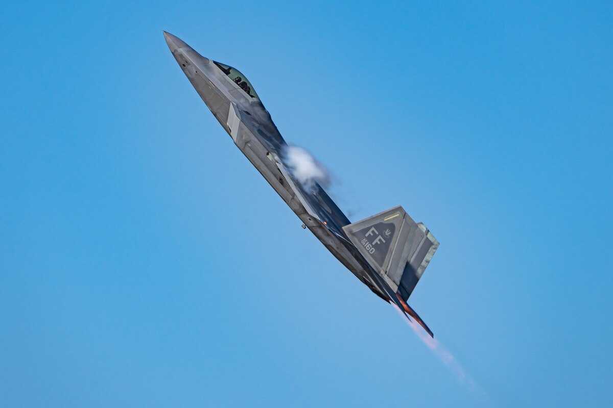 U.S. Air Force Maj. Joshua “Cabo” Gunderson, F-22 Raptor Demonstration Team commander and pilot, pulls into a vertical climb during the initial rehearsal at the 2022 FIDAE Air & Trade Show, April 3, 2022 in Santiago, Chile.