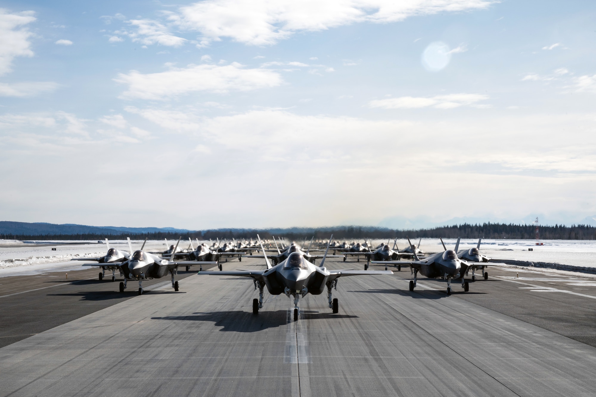 A formation of 42 F-35A Lightning II’s assigned to the 354th Fighter Wing, wait on the flight line