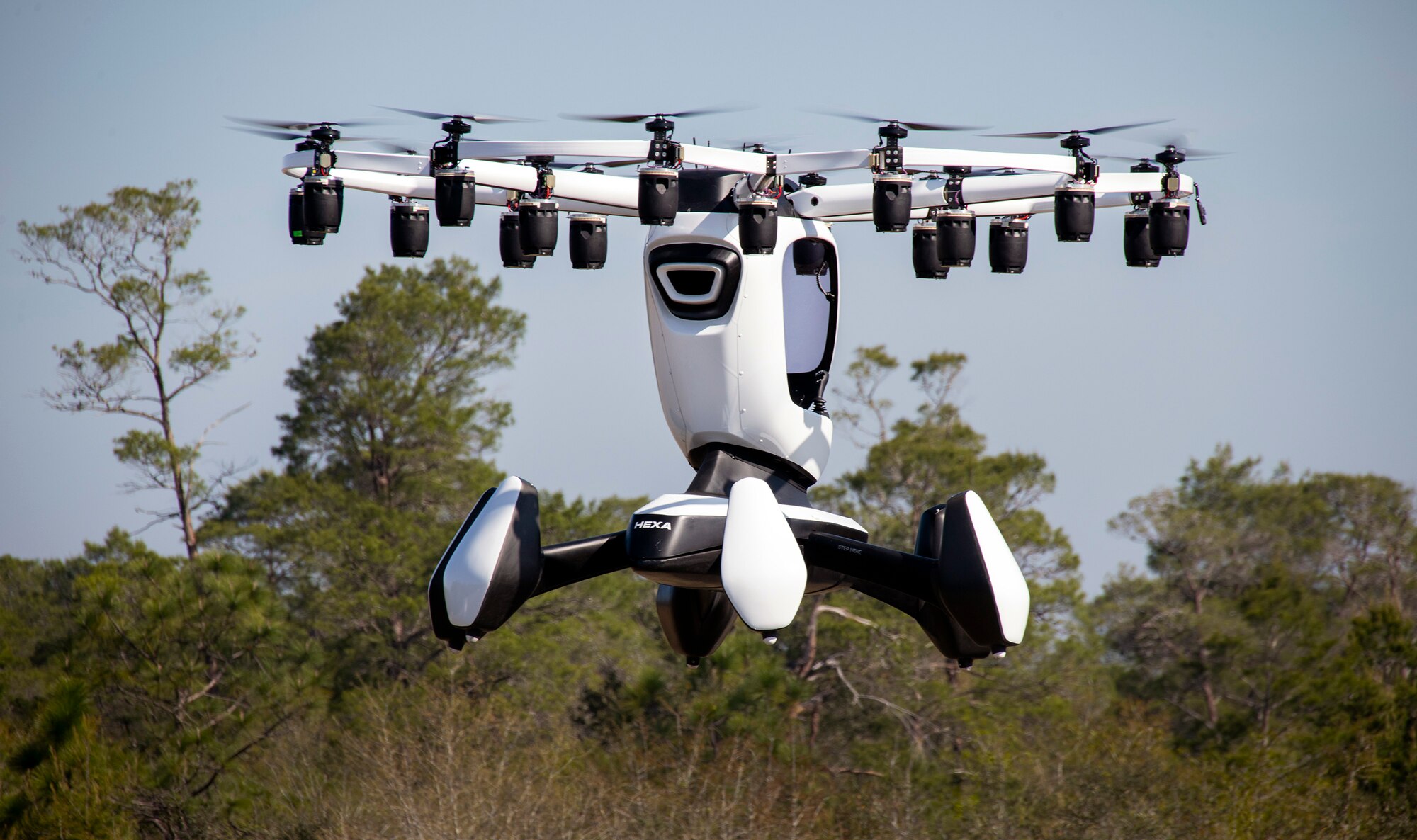The Hexa, an electric, vertical takeoff and landing aircraft, hovers in the air