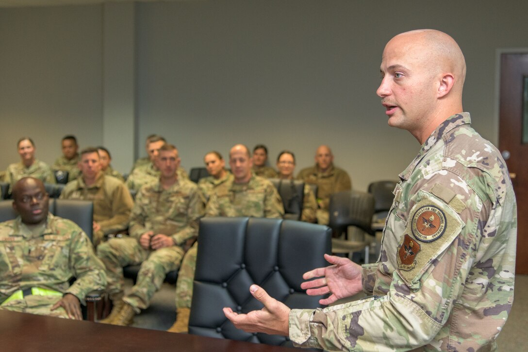 Capt. Trenidy Thomas, 24th Training Squadron flight commander and former Officer Training Squadron instructor, addresses the OTS instructor cadre. Eligible active-duty Line of the Air Force officers can apply for the calendar year 2023 Officer Instructor & Recruiting Special Duty Nomination Board April 11 to May 14. (U.S. Air Force photo by Trey Ward)