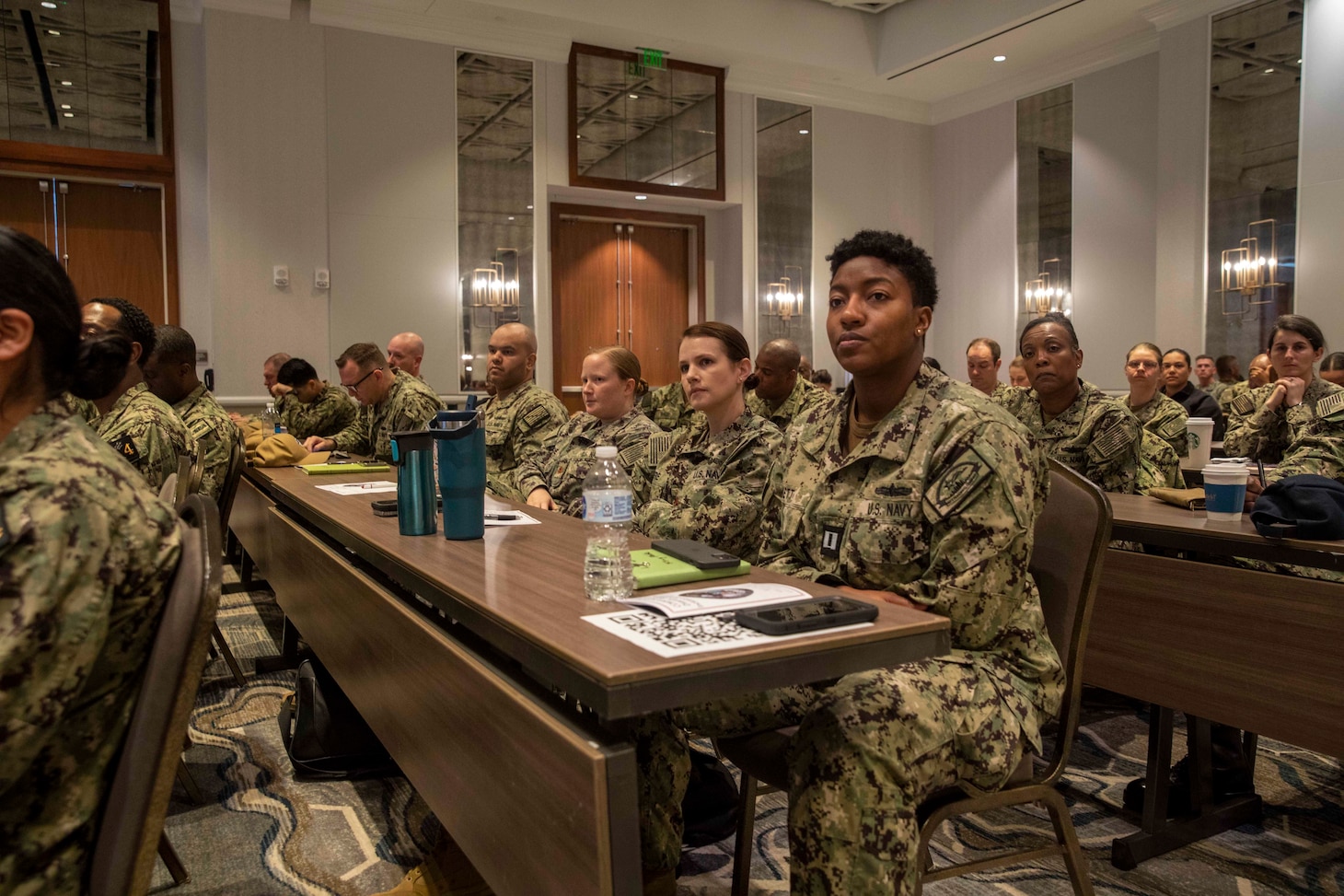 Sailors listen to a panel of speakers during the first-ever Naval Surface Force Diversity, Equity, and Inclusion Summit (DEI) Symposium.