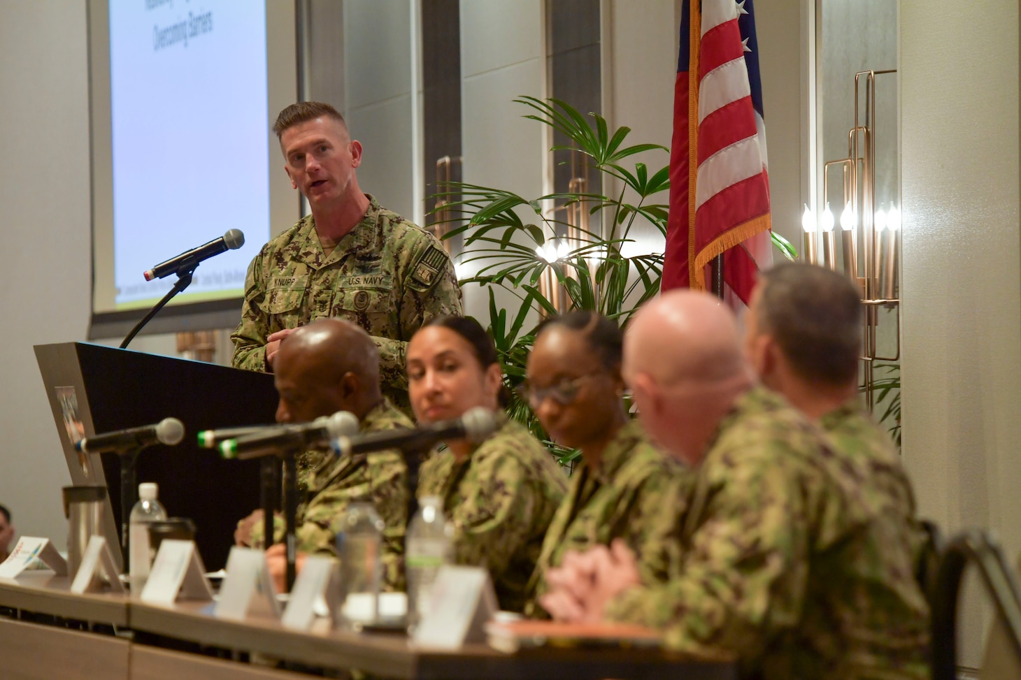 Force Master Chief Jason Knupp, far left, leads a panel during the first-ever Naval Surface Force Diversity, Equity, and Inclusion Summit (DEI) Symposium.
