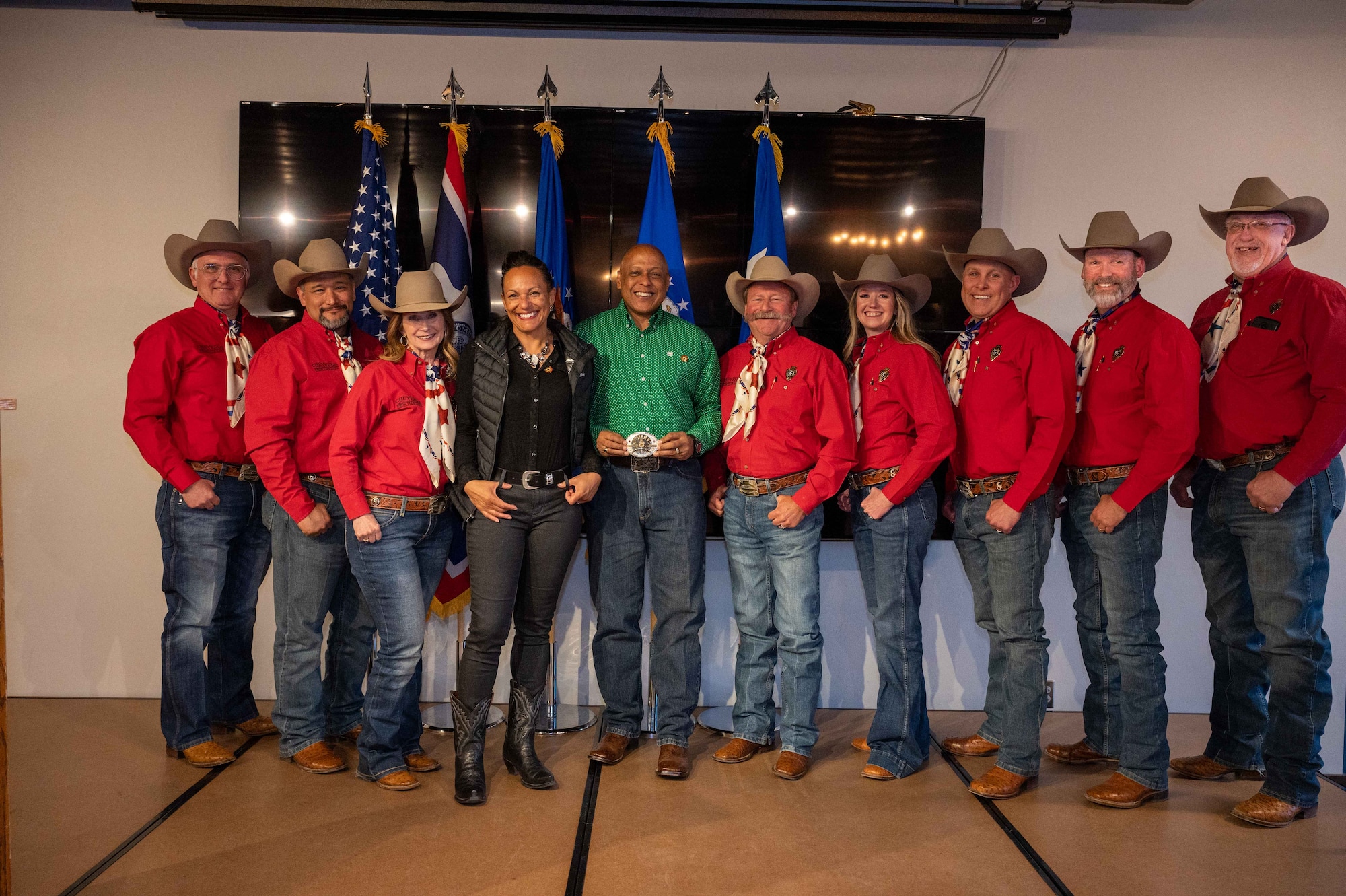 People stand together for a group photo