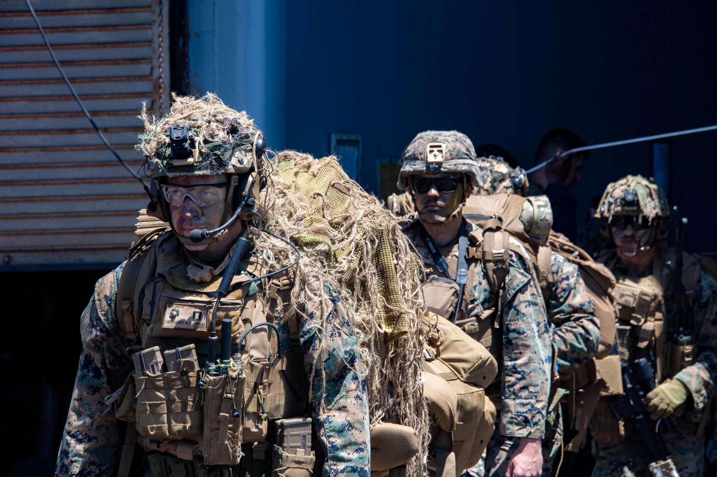 U.S. Marines with 1st Battalion, 3rd Marines, 3rd Marine Division prepare to board a CH-53E Super Stallion helicopter assigned to Marine Heavy Helicopter Squadron 466 (HMH-466) on the flight deck of the forward-deployed amphibious dock landing ship USS Ashland (LSD 48) during Balikatan 22, off the coast of the Philippines, March 28, 2022. Balikatan is an annual exercise between the Armed Forces of the Philippines and U.S. military designed to strengthen bilateral interoperability, capabilities, trust, and cooperation built over decades shared experiences. Balikatan, Tagalog for 'shoulder-to-shoulder,' is a longstanding bilateral exercise between the Philippines and the United States highlighting the deep-rooted partnership between both countries. Balikatan 22 is the 37th iteration of the exercise and coincides with the 75th anniversary of U.S.-Philippine security cooperation.