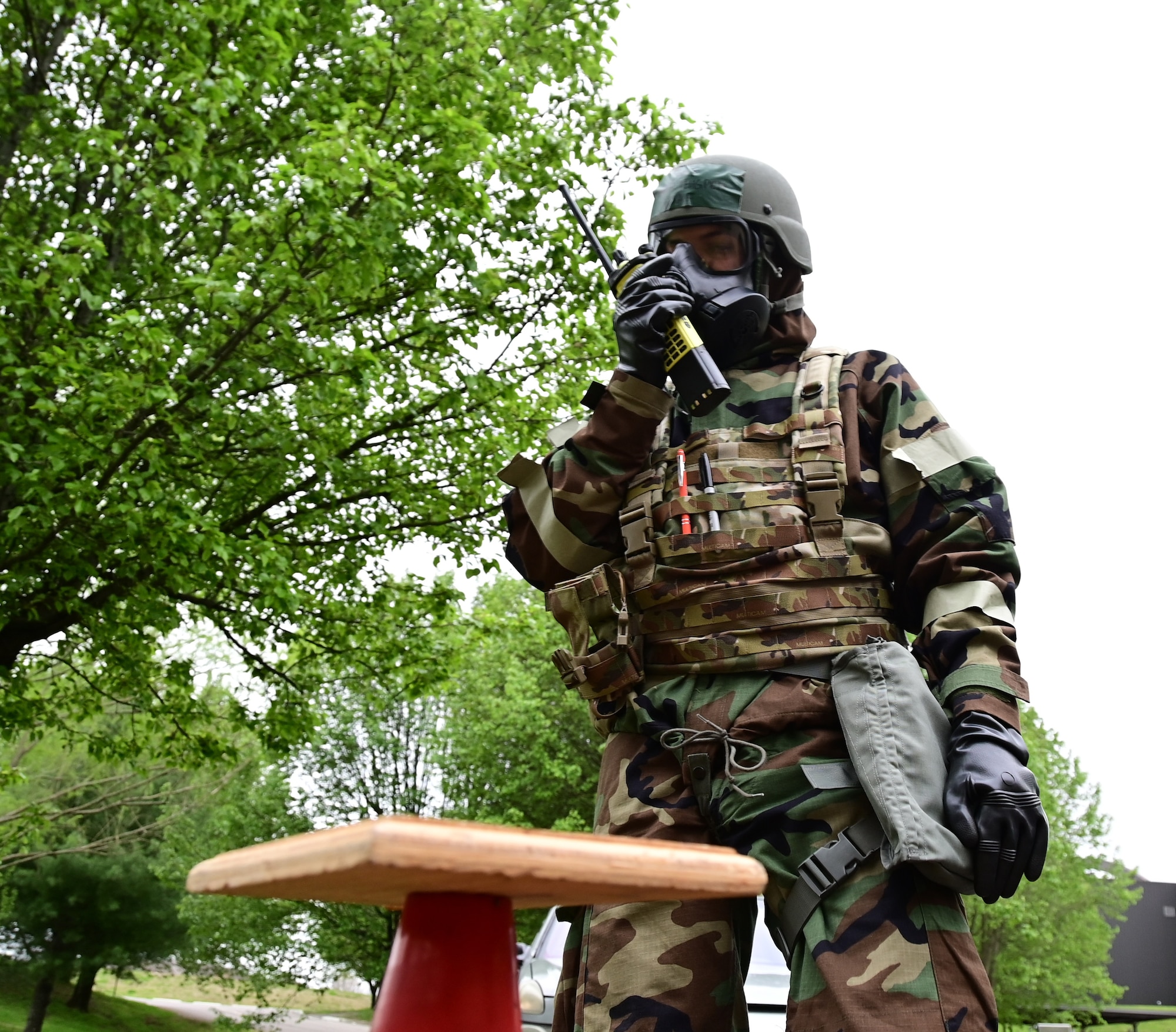 A member of the 118th Emergency Management Office checks M9 paper for contamination April 8, 2022, at Berry Field Air National Guard base, Nashville, Tennessee. Members from across the 118th Wing took part in the largest on-base readiness exercise in wing history April 5-9, to prepare for a near-peer conflict.