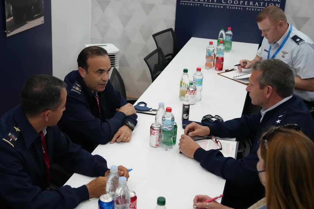 Major General Barry Cornish, 12th Air Force (Air Forces Southern) commander (right) and Mayor General Piloto Leonel Amilcar Muñoz Noboa, Commanding General of the Dominican Republic Air Force (left) meet for a bilateral key leader engagement during Feria Internacional del Aire y del Espacio (FIDAE), Latin America’s largest aerospace, defense and security exhibition, in Santiago, Chile, April 7, 2022.