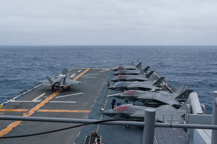 An F-35B Lightning II aircraft attached to Marine Operational Test and Evaluation Squadron 1 takes off aboard amphibious assault ship USS Tripoli, Mar. 31. VMX-1 is embarked aboard Tripoli as part of the U.S. Marine Corps’ Lightning carrier concept demonstration. The Lightning carrier concept demonstration shows Tripoli and other amphibious assault ships are capable of operating as dedicated fixed-wing carrier platforms, capable of bringing fifth generation Short Takeoff/Vertical Landing aircraft wherever they are required.