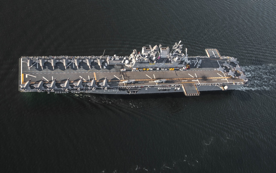 Amphibious assault ship USS Tripoli, departs Naval Air Station North Island, Calif., April 7, 2022. Tripoli completed flight deck operations with 20 F-35B Lightning II jets from Marine Fighter Attack Squadrons 211 and 225, Marine Aircraft Group 13, and 3rd Marine Aircraft Wing, as well as Marine Operational Test and Evaluation Squadron 1, as part of the U.S. Marine Corps’ Lightning carrier concept demonstration. The Lightning carrier concept demonstration shows Tripoli and other amphibious assault ships are capable of operating as dedicated fixed-wing strike platforms when needed, capable of bringing fifth generation Short Takeoff/Vertical Landing aircraft wherever they are required.