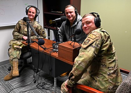 From left, Senior Airman Ashtin Steen, Staff Sgt. Chris Wood and Tech. Sgt. Sean Wood of the 157th Maintenance Squadron, 157th Air Refueling Wing, New Hampshire Air National Guard, mic up for a podcast episode of Your NH Guard on March 2, 2022, at Pease Air National Guard Base in Newington, New Hampshire. (Photo by Tech. Sgt. Charles Johnston)