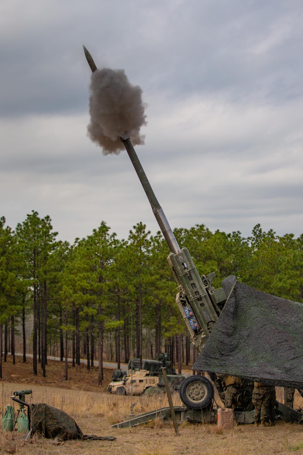 U.S. Marines with Fox Battery, 2d Battalion, 10th Marine Regiment, 2d Marine Division, fire an M777 howitzer during Exercise Rolling Thunder 22-2 on Fort Bragg, North Carolina, March 30, 2022.
