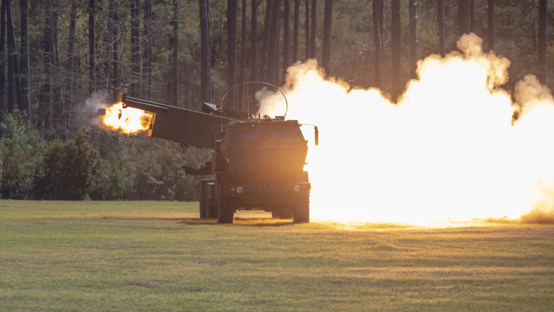 U.S. Marines with 10th Marine Regiment, 2d Marine Division, fire a reduced range practice rocket from a M142 High Mobility Artillery Rocket System during Exercise Rolling Thunder 22-2 on Camp Lejeune, North Carolina, April. 4, 2022. This exercise is a 10th Marines-led live-fire artillery event that tests the unit's abilities to operate in a simulated littoral environment against a peer threat in a dynamic and multi-dominated scenario. (U.S. Marine Corps photo by Lance Cpl. Megan Ozaki)