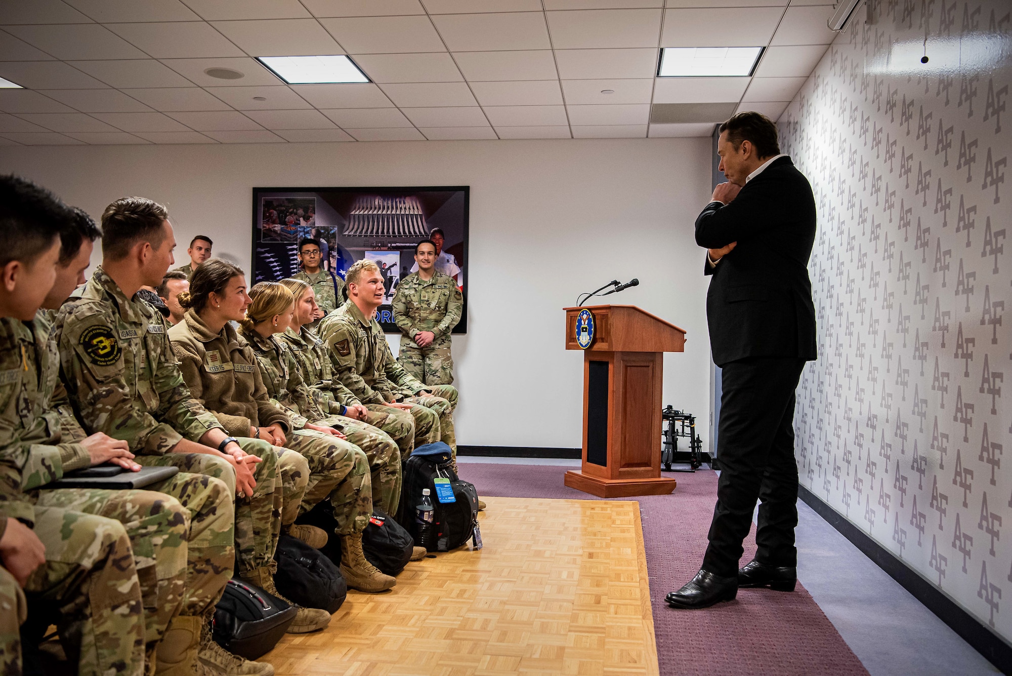 Elon Musk standing in room in front of seated cadets at the U.S. Air Force Academy, Colorado, April 7, 2022.