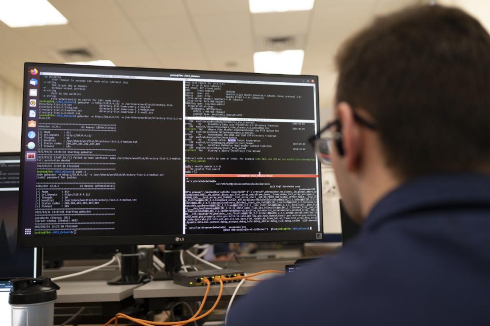 A U.S. Coast Guard Academy cadet, a member of the Academy's cyber team looks at his computer while participating in the National Security Agency's (NSA) annual cyber exercise (NCX), here, Mar. 31, 2022. The Academy's cyber team won third place out of 12 total teams. (U.S. Coast Guard photo by Petty Officer 3rd Class Matthew Abban)