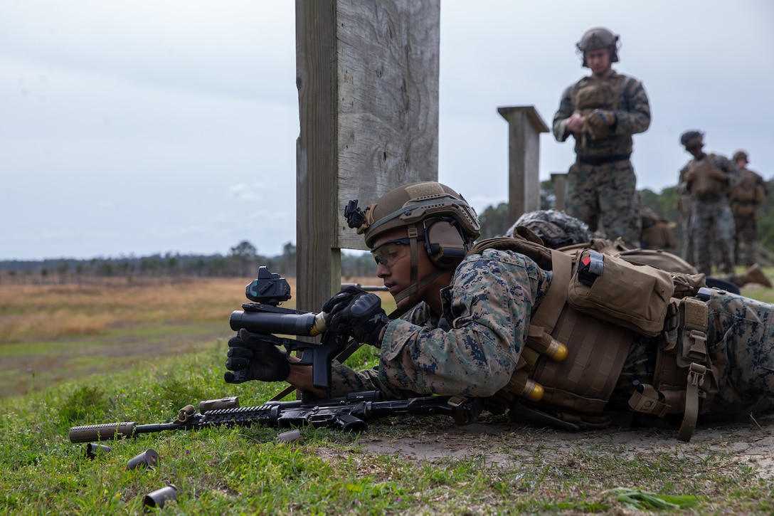U.S. Marine Corps Pfc. Delroy Smith, a rifleman with 3rd Battalion, 6th Marine Regiment, 2d Marine Division, reloads a M320 Grenade Launcher on Camp Lejeune, North Carolina, April 5, 2022.