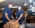 220405-N-BB298-1047

PORTSMOUTH, Va. (April 4, 2022) Capt. Jason Longwell, Naval Medical Center Portsmouth (NMCP) Anesthesiology chief of services (left) and Tamera Larsen, Certified Registered Nurse Anesthetist (right) participate in high-frequency task training, April 5. Staff from the Anesthesia Department conducted a central line training to refresh their skills on this procedure that takes place when a patient needs medicine given through the veins over a long period of time. (U.S. Navy Photo by Petty Officer 3rd Class Ariana Torman/Released)