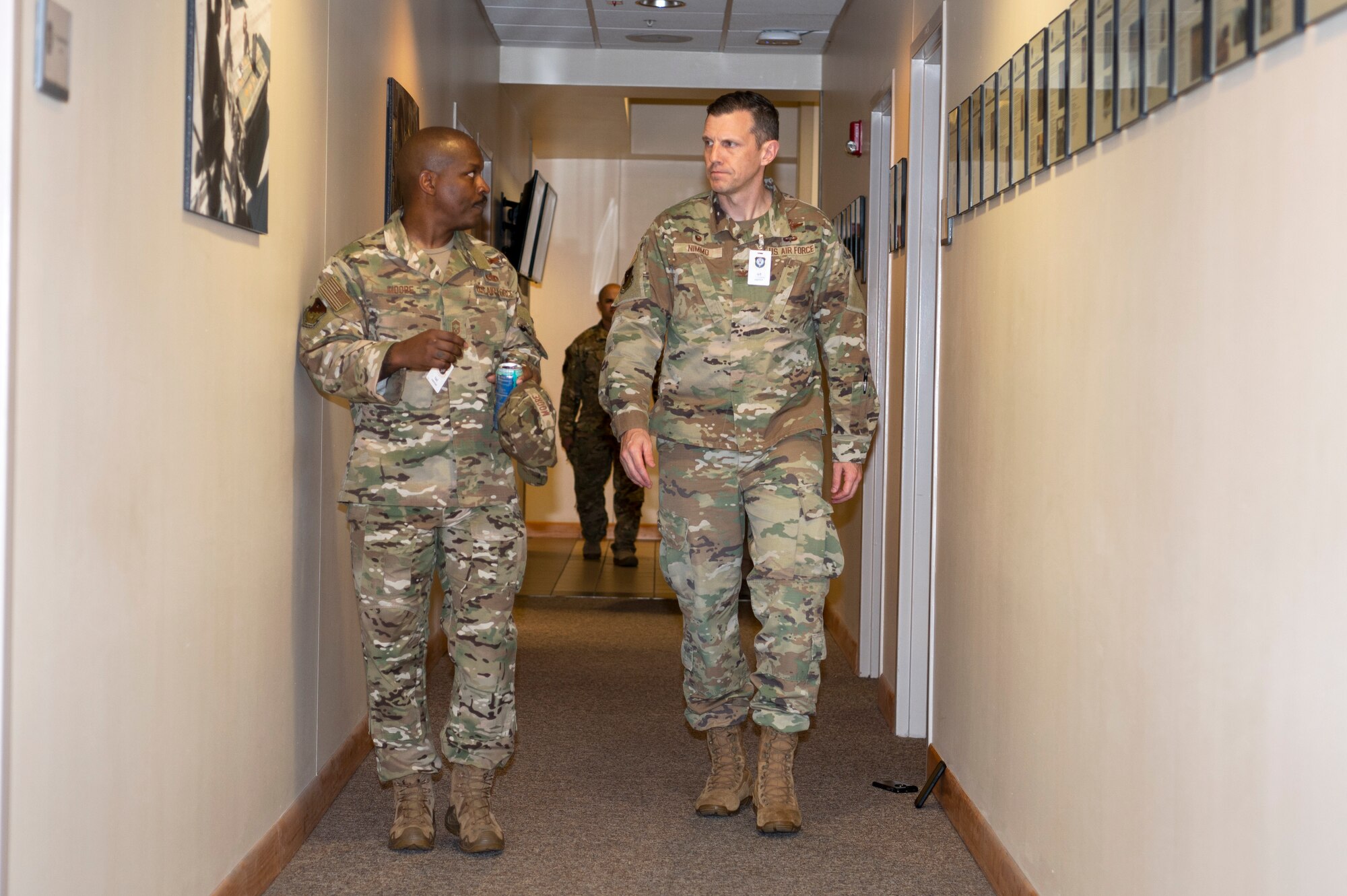 U.S. Air Force Col. Caleb Nimmo, 492d Special Operations Wing commander (right) and U.S. Air Force Chief Master Sgt. Mark Moore, 492d Special Operations Training Group senior enlisted advisor, arrive at the 19th Special Operations Squadron for an Air Force Integrated Technology Platform Virtual Reality demonstration, April 5-6, at Hurlburt Field, Florida.