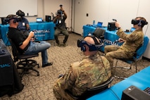 Airmen take part in a virtual reality simulation as part of an Air Force Integrated Technology Platform Virtual Reality demonstration, April 5-6, at Hurlburt Field, Florida.