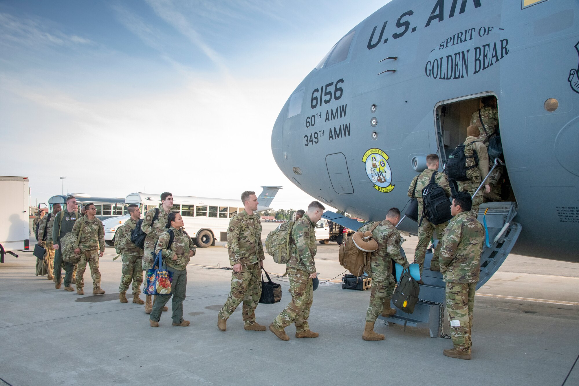 U.S. Airmen board a C-17 Globemaster III