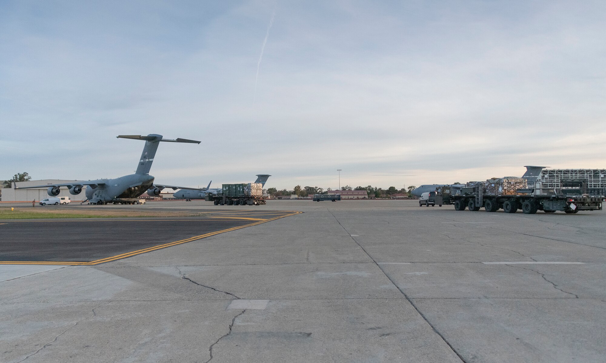 airplanes sit on the flight line