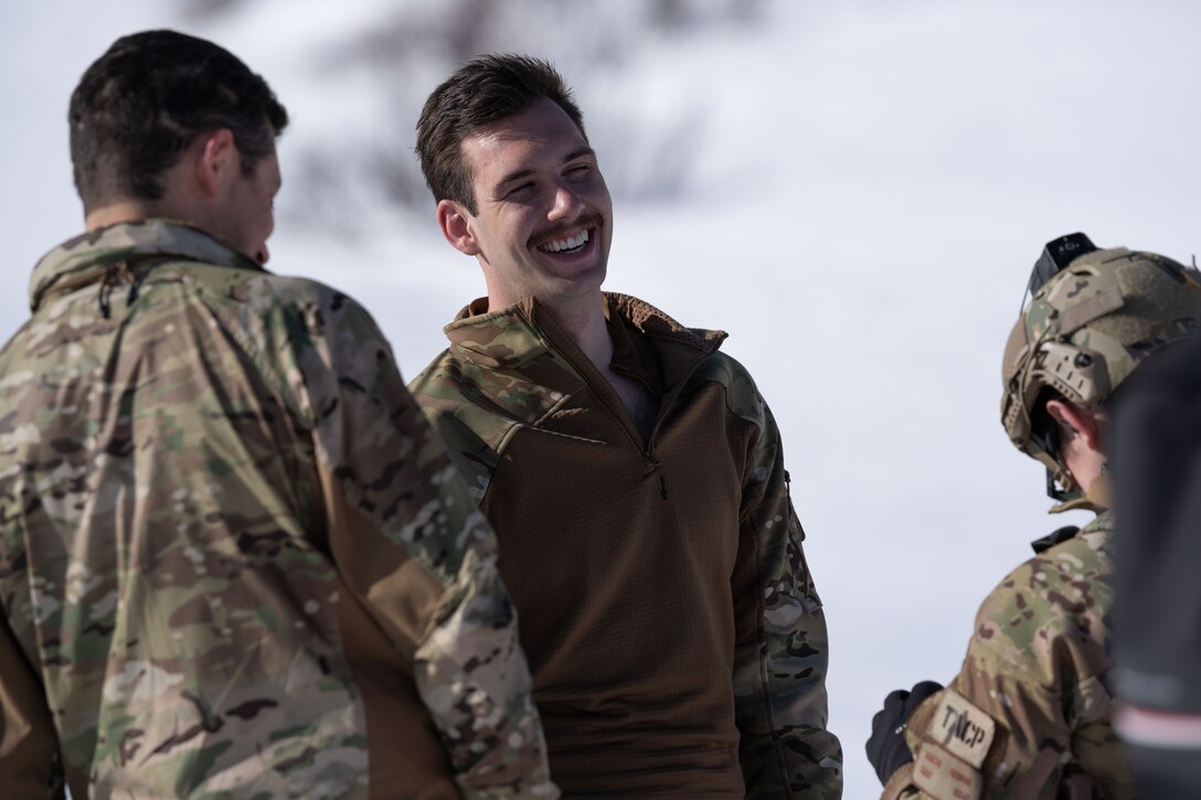 Photo of Airmen laughing at Geronimo Drop Zone