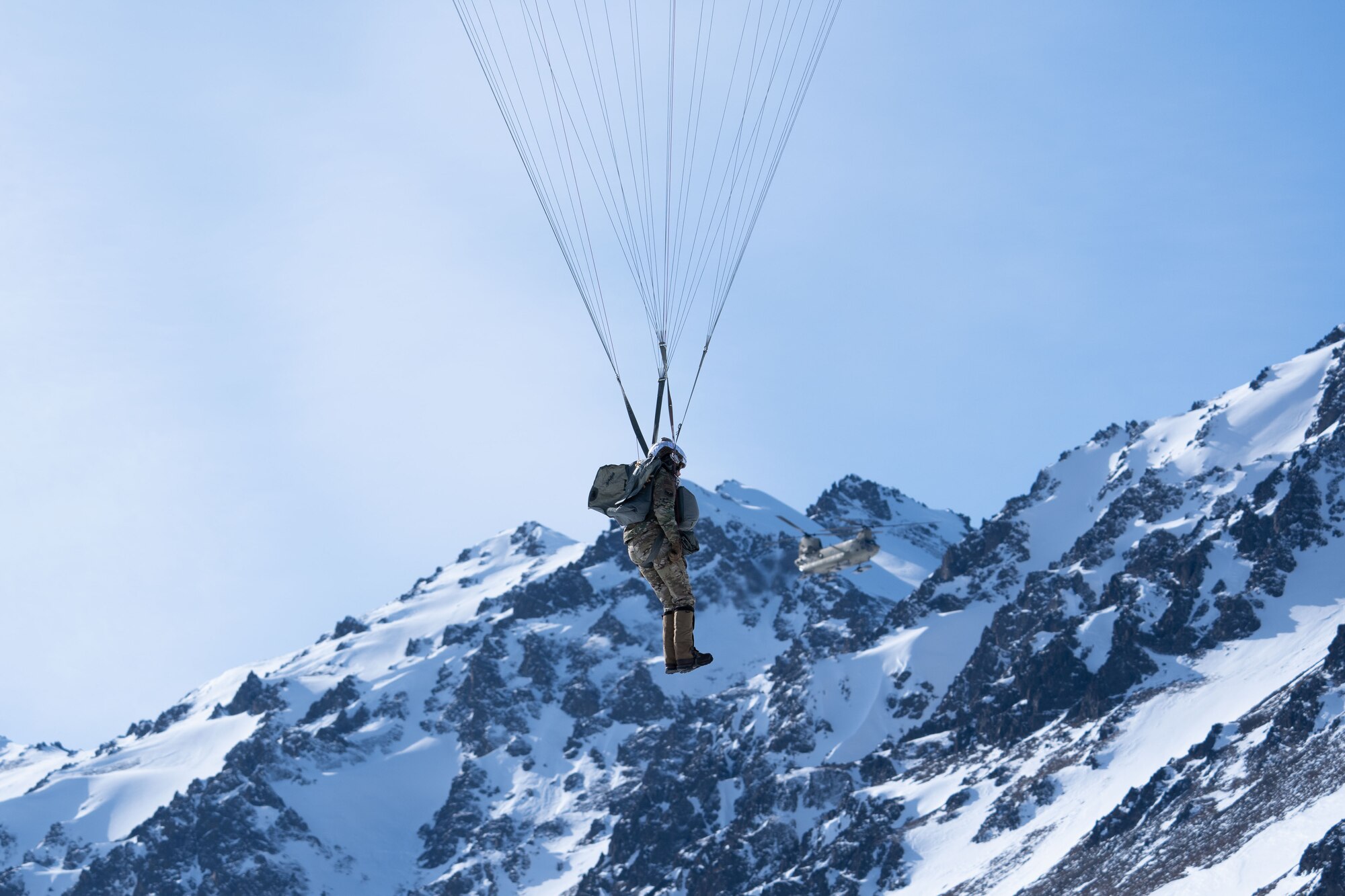 Photo of an Airman descending over Geronimo Drop Zone